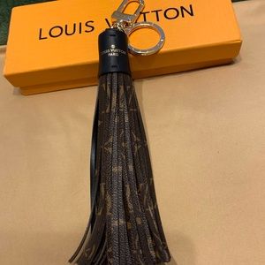 Authentic Louis Vuitton tassel and bag charm